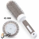 فرشاة شعر حرارية دائرية فيلفيل أثناء استخدامها لتصفيف وتجفيف الشعر باستخدام مجفف الهواء