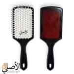 فرشة شعر بونيتا 013 داخل عبوتها الشفافة، مع ظهور اسم BONITA وتصميم المقبض الأسود والشعيرات البيضاء.